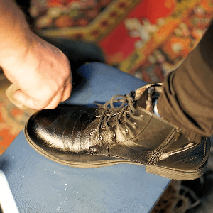 Cleaning and spot removers for shoe care tasks